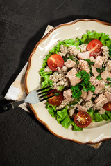 Wall Mural - Tasty salad with couscous, tuna and vegetables