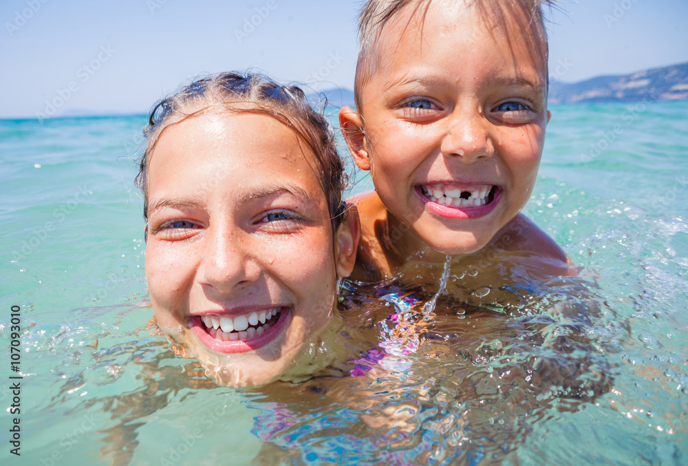 Kids playing in sea. Stock Photo | Adobe Stock