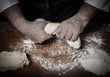 The process of making home bread by male hands. Toned