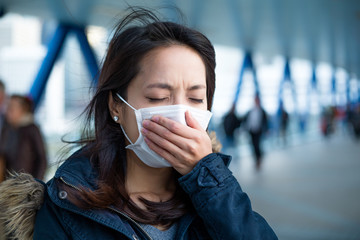 Poster - Woman wearing face mask at outdoor