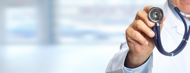 Wall Mural - Hand of doctor with a stethoscope.