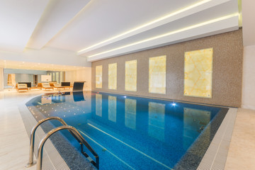 Modern indoor pool  in SPA at hotel