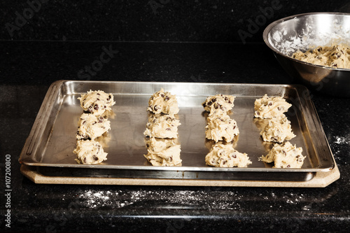 Valokuva Balls Of Chocolate Chip Cookie Dough On Baking Sheet