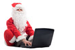 © ZoneCreative - santa claus lay using laptop on white background