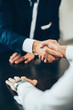 Handshake confirming business deal
