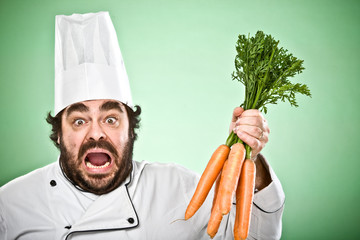 smile chef cooking with knife isolated on green