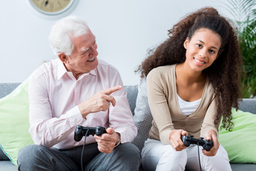 Canvas Print - Elders winning in video games with youth