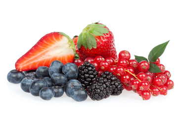 tasty ripe mixed berries with leaf isolated on white