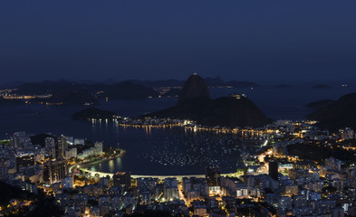 Sugar Loaf Mountain by Night  / Night view of Sugar Loaf mountain and Guanabara Bay, Rio de Janeiro, Brazil.