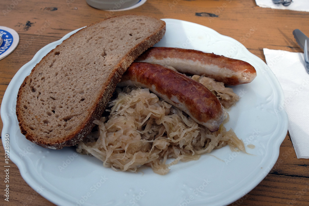 fränkische Bratwürste mit Sauerkraut und Brot Stock Photo | Adobe Stock