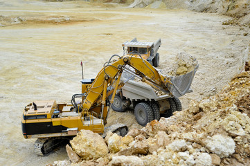 Surface Mine / In the Surface Mine during the loading of raw materials into a truck
