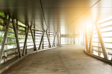 Wall Mural - Empty long corridor in the modern office building