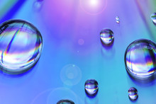 Macro Of Water Drops On Multicolor Background