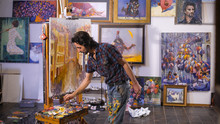 Inspiration. Colorful Professional Artist Paints With Oil. Workshop