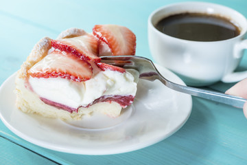 Canvas Print - eating Pie with strawberries and cream with a fork