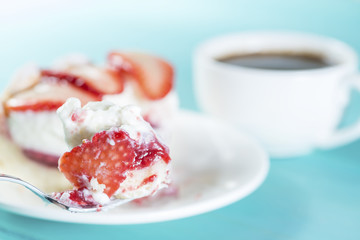 Poster - eating Pie with strawberries and cream on a spoon, shallow dof