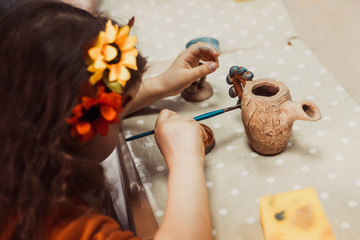 Wall Mural - children's hands sculpts