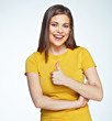 © Yuriy Shevtsov - Smiling woman casual dressed show thumb up.