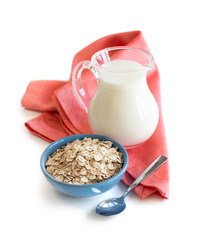 Wall Mural - Rolled oats in a bowl and milk
