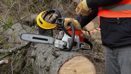 Sticker - Lumberjack trying to start chainsaw