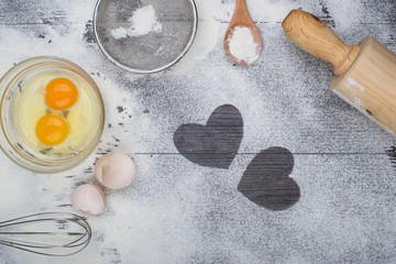 heart of flour on wooden desk