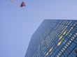 © robertharding - Looking up at Boston skyscraper and USA flag, Boston, Massachusetts, New England