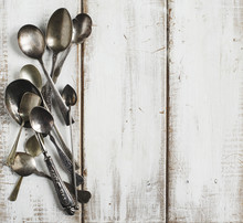 Vintage Spoons On Wooden Background