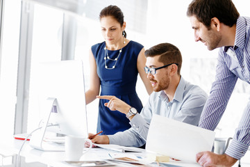 Wall Mural - Business people in modern office