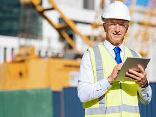 Wall Mural - Engineer builder at construction site