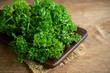 Bunch of parsley on a rustic wooden table