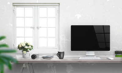 Wall Mural - Computer with blank screen on office desk. Window and white wall in background.