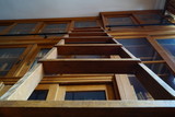 Fototapeta Miasto - Wooden Ladder in the Library