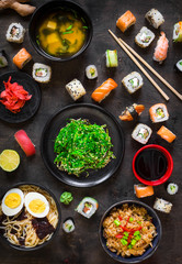 Wall Mural - Table served with sushi and traditional japanese food