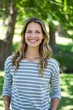 © WavebreakmediaMicro - Portrait of a smiling woman in a park