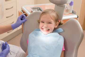 Wall Mural - Young girl at dentist., dental treatment 
