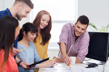 Wall Mural - happy creative team or students working at office