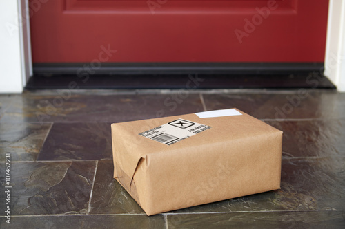 Stampa su Tela Close Up Of Parcel Delivery Outside Front Door