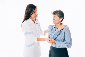 Nurse trying to comfort a woman patient