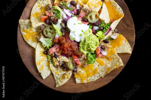 Fényképezés Nacho Cheese Tortilla chips with chili and salsa