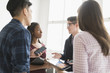 © JGI/Tom Grill/Blend Images - Business people working together in office with technology
