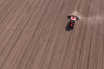 aerial view of  tractor on harvest field