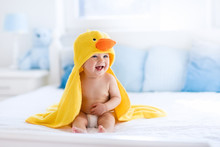 Cute Baby After Bath In Yellow Duck Towel