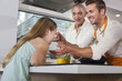 © Sam Diephuis/Blend Images - Caucasian father, daughter and grandfather cooking in kitchen