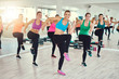 © Flamingo Images - Group of fit young women doing exercise together