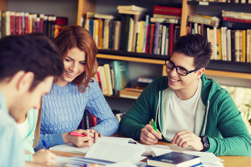 Canvas Print - students preparing to exam and writing in library