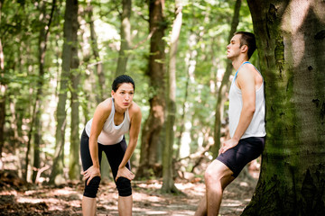 Wall Mural - Couple resting after jogging