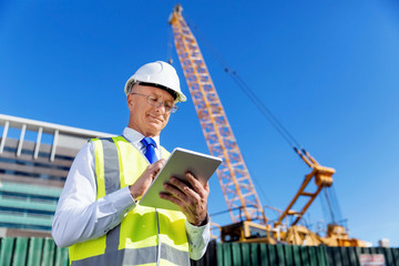 Engineer builder at construction site