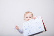 © al1188 - Baby girl drawing with colorful felt-tip pens on white background