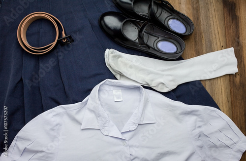 Fotografía Still life : Thai Student girl uniform with wooden background on top view