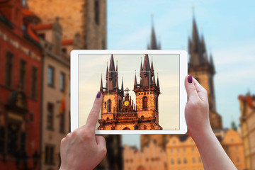 Aufkleber - Photographing city sight with tablet. Woman holding a white tablet.